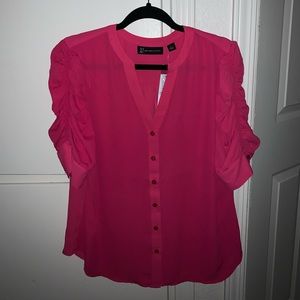 Hot pink blouse with ruffles sleeves